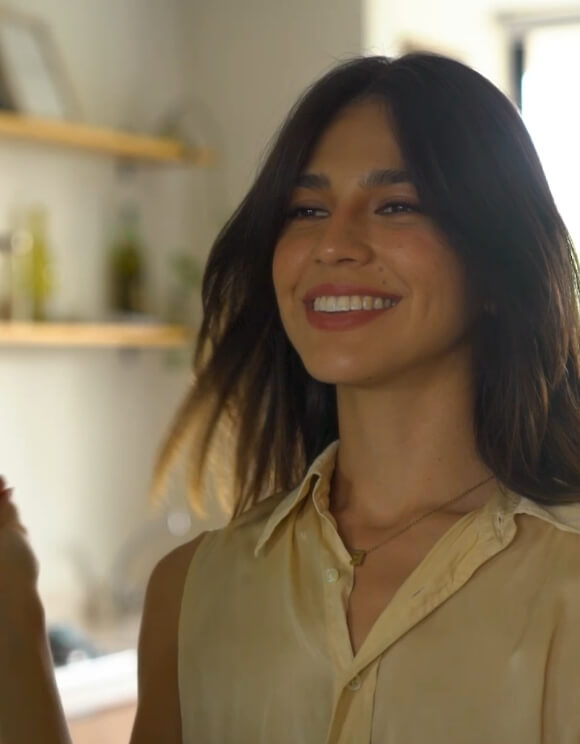 Woman smiling.